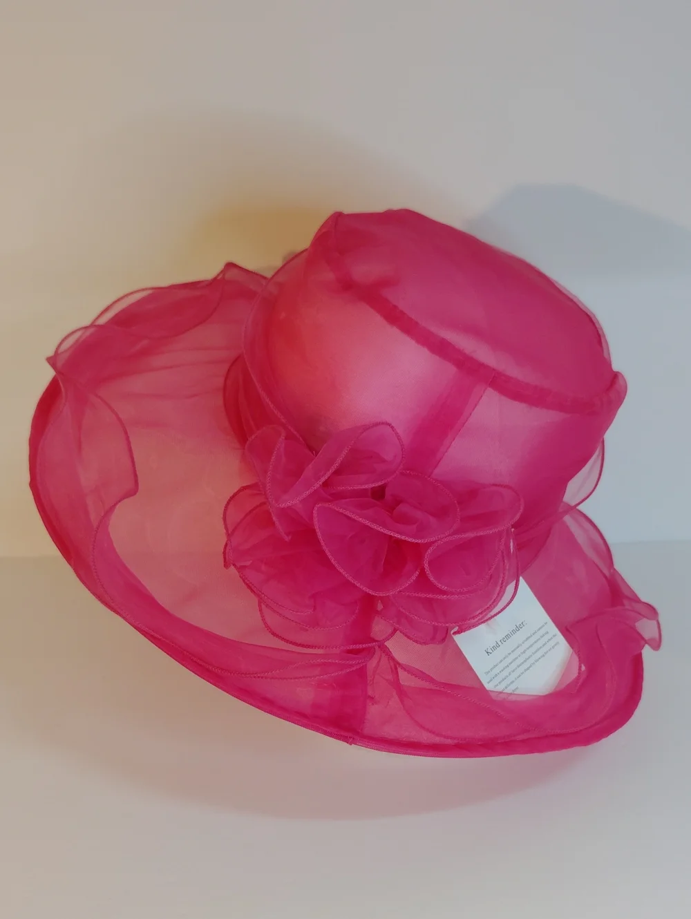 Elegant Hot Pink Organza Dress Hat with Floral Accent